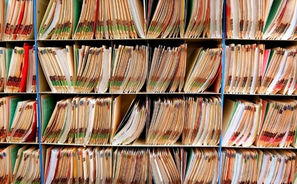 A shelf full of medical records