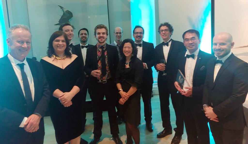 A group of people in black tie gathered at the Australian Museum for the Eureka Prizes.