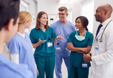 A group of medical professional having a conversation